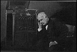 Photograph of Thomas A. Edison listening to the New Edison Diamond Disc Phonograph