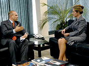 The finance minister, Guido Mantega, and the former president of the Supreme Federal Court, Ellen Gracie Northfleet.
